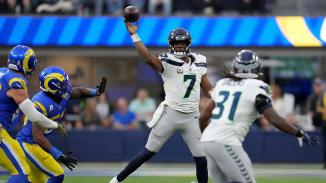 Seattle Seahawks quarterback Geno Smith (7) throws a pass against the Los Angeles Rams in the third quarter at SoFi Stadium.